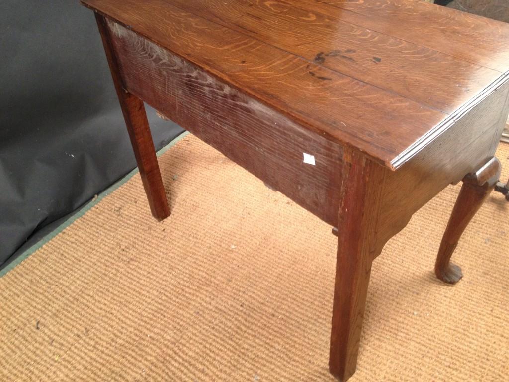 An 18th century oak Low boy, with re-entrant corners, three small drawers, on cabriole legs and - Image 5 of 5