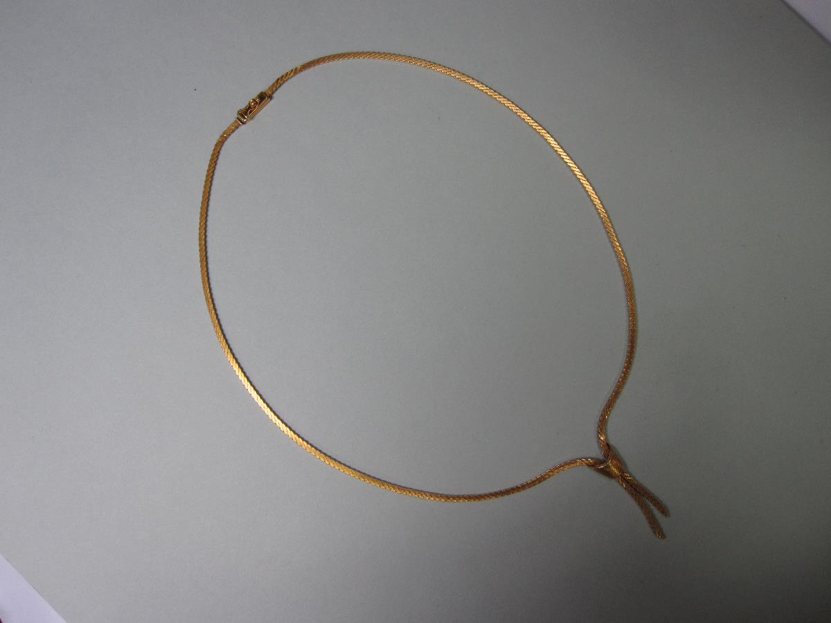 An 18ct gold modern negligée necklace, formed of flattened textured snake links with ribbon end - Image 3 of 3