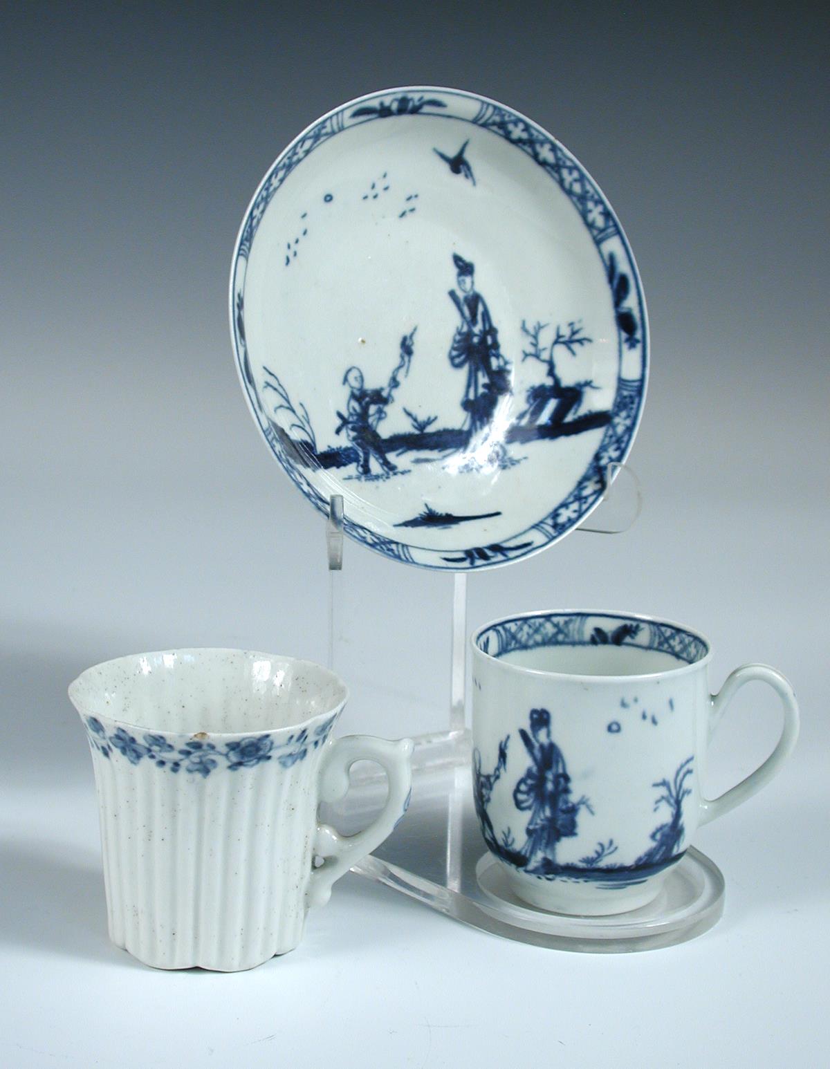 An early George III Worcester blue and white cup and saucer together with a coffee cup, the first