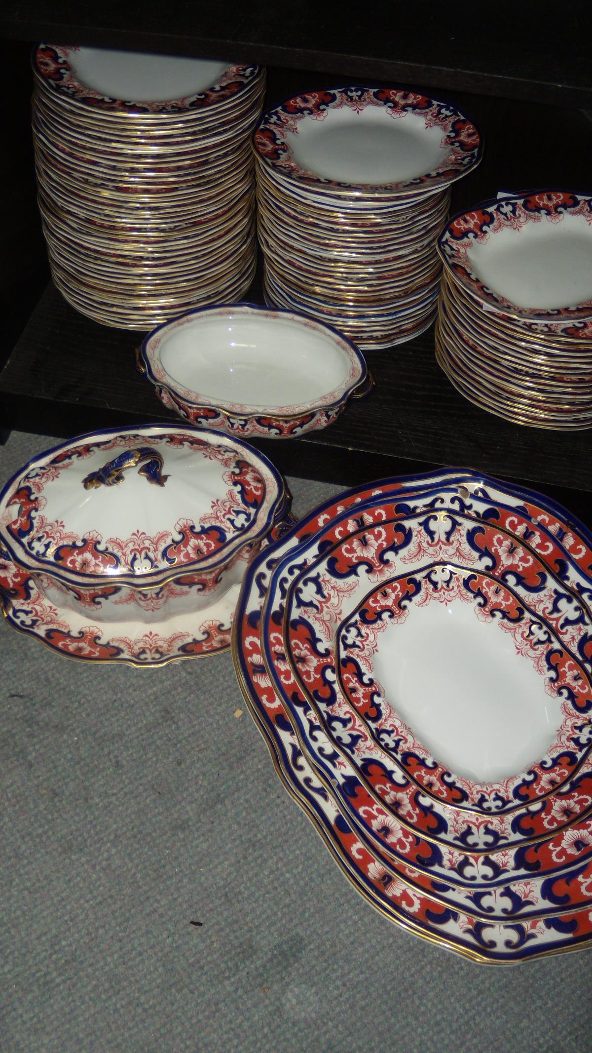 A Crown Derby Imari palette dinner service, date code for 1898, each piece decorated with the 3973