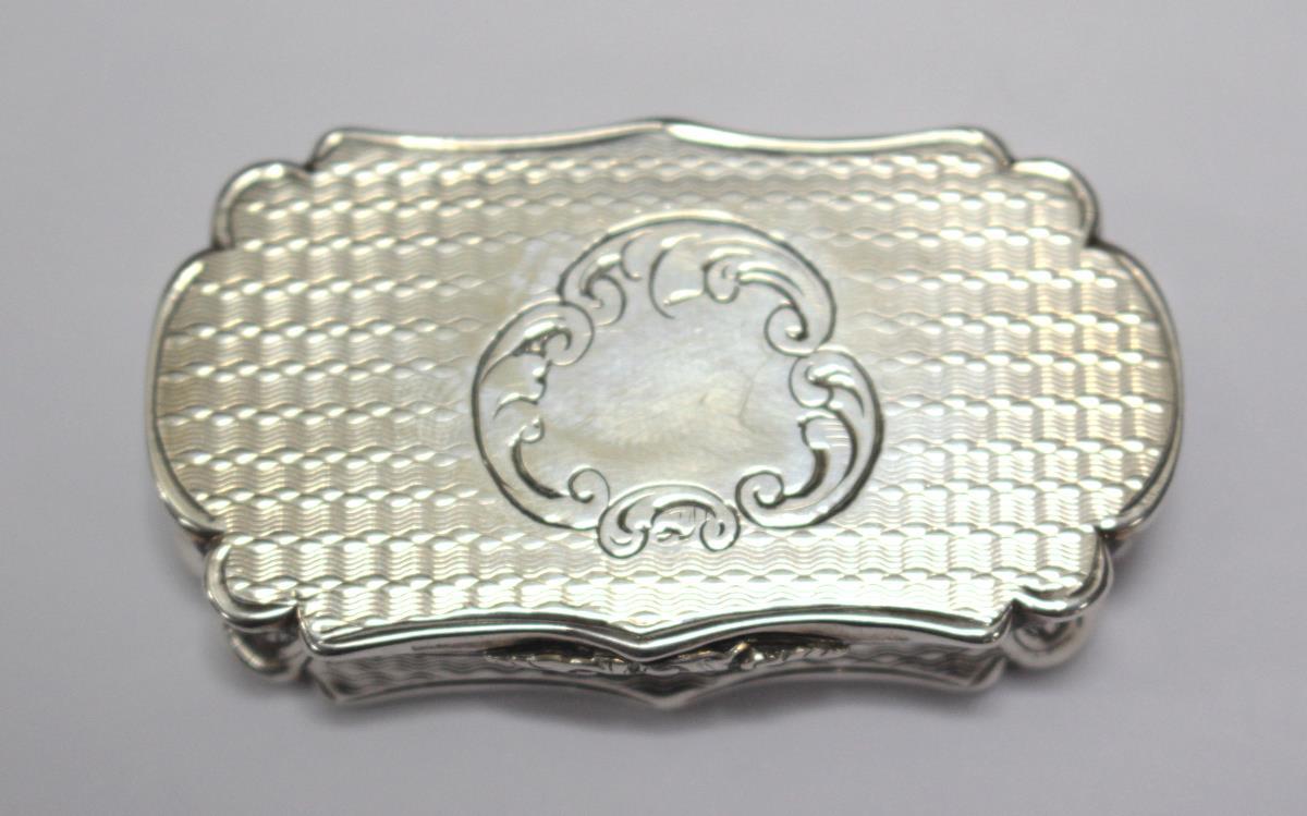 A large Victorian silver vinaigrette by Alfred Taylor, Birmingham 1853, of serpentine form, engine - Image 2 of 6