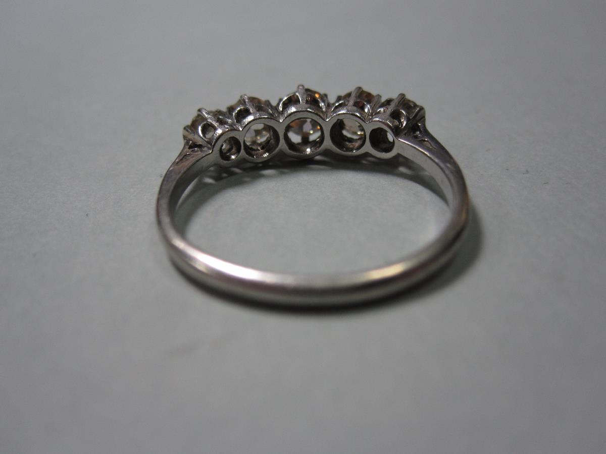 An old cut diamond five stone ring, the graduated approximately round old cut diamonds claw set to - Image 3 of 4