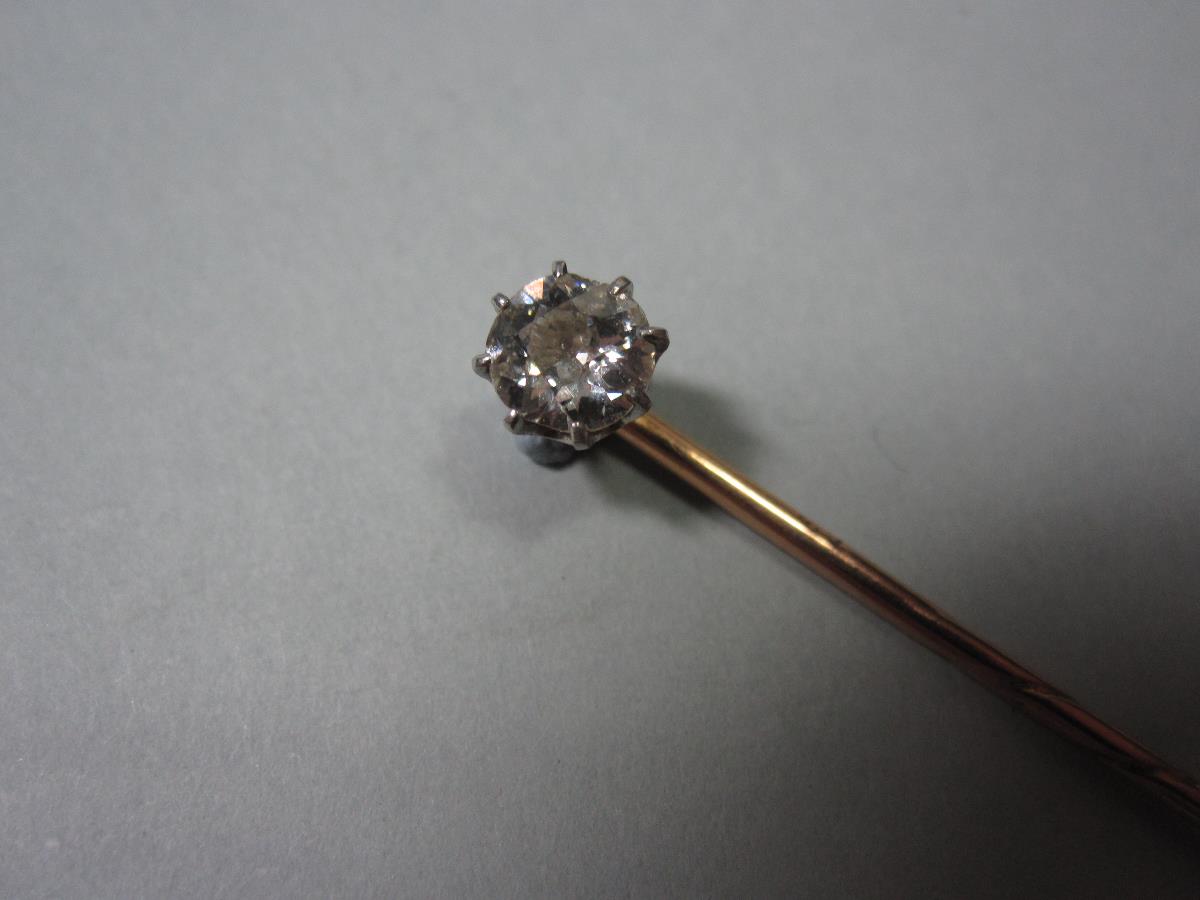 A cased diamond stick pin, the head of the pin claw set with a single old round brilliant cut - Image 2 of 3