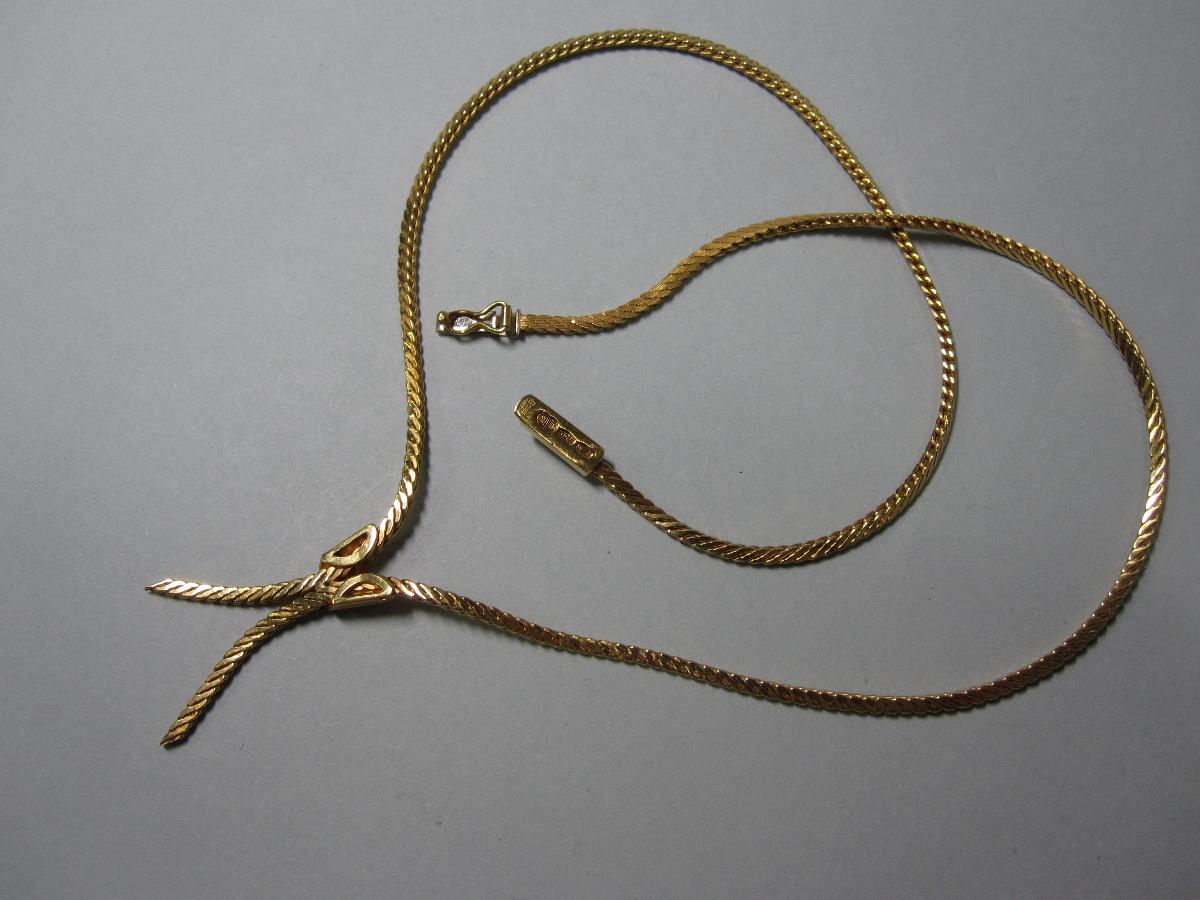 An 18ct gold modern negligée necklace, formed of flattened textured snake links with ribbon end - Image 2 of 3