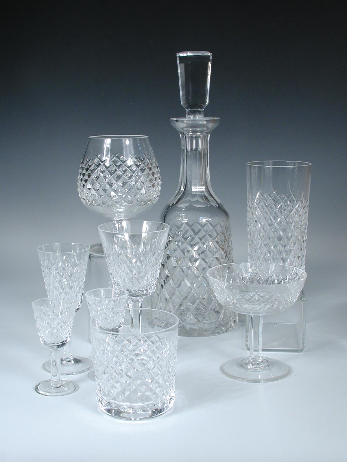 A suite of `Waterford` Alanna pattern drinking glass, each of the tapering bowls diamond diaper