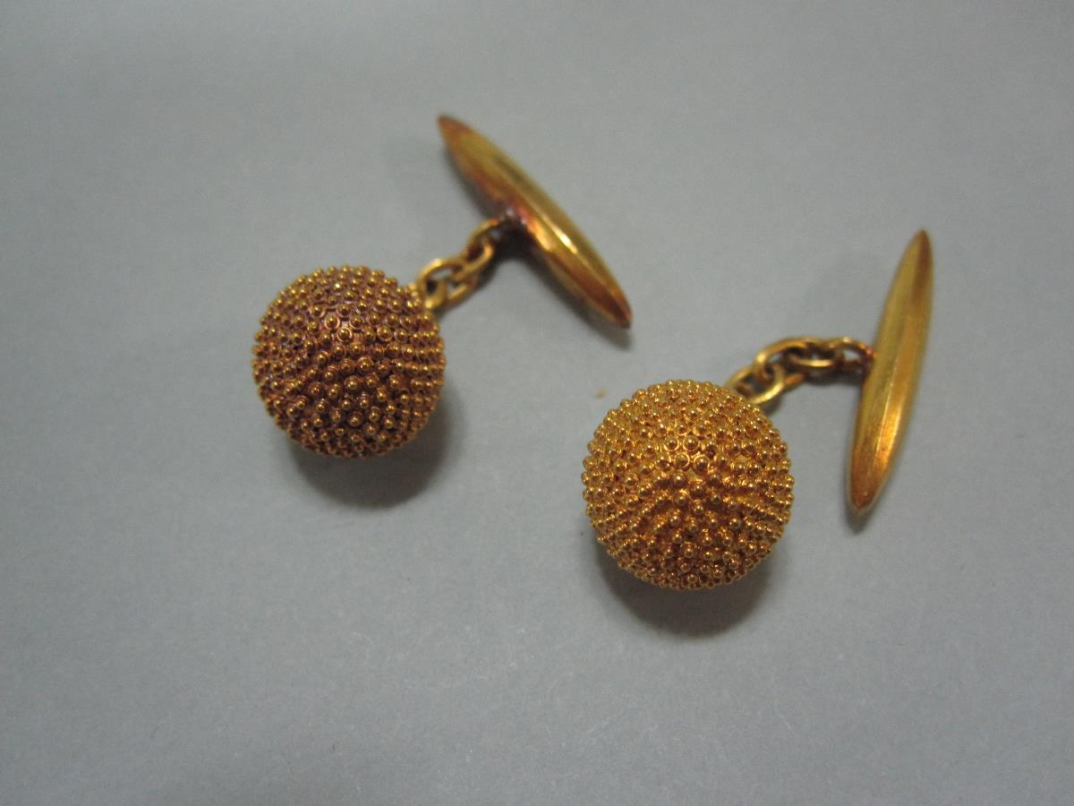 A pair of beaded ball cufflinks, each with a hollow 11mm ball entirely covered with granular