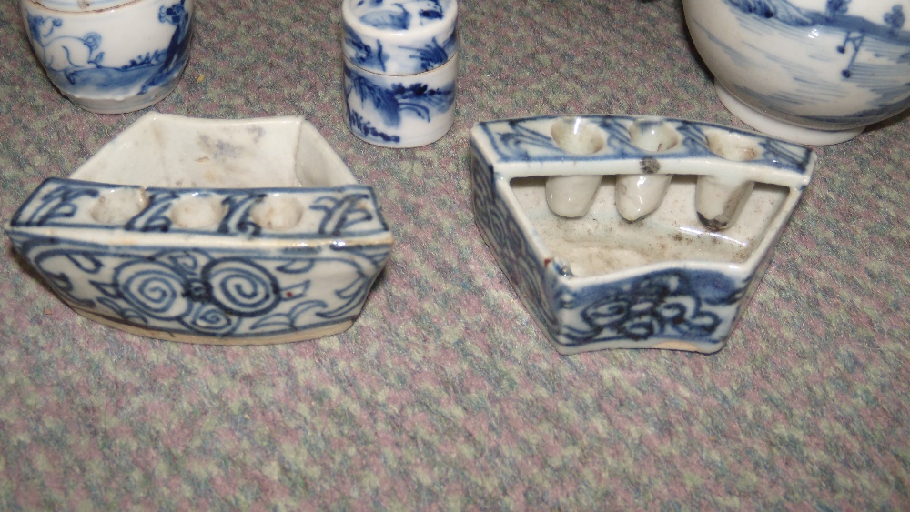 A collection of 18th and 19th century blue and white wares, the jug and the bowl painted with - Image 2 of 4