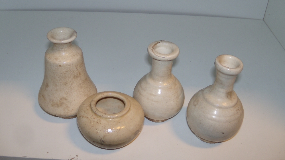 Three tingyao vases and a jarlet, possibly southern Chinese and 11th/12th century, two of bottle