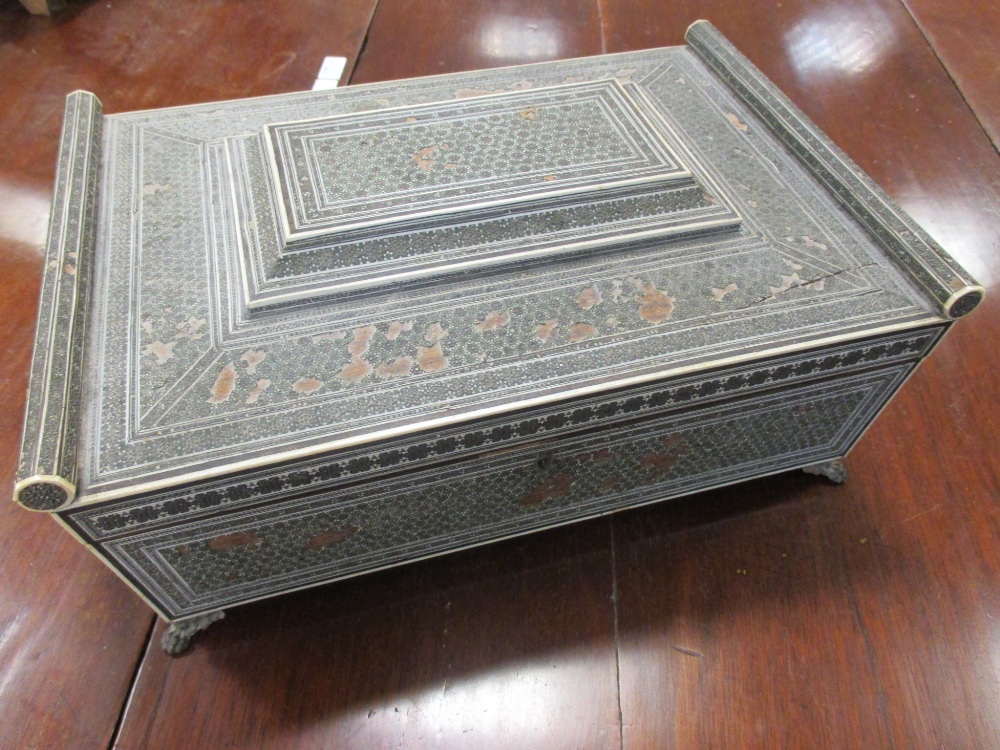 A 19th century Anglo-Indian Sedeli ware sewing box, on lion paw feet, losses