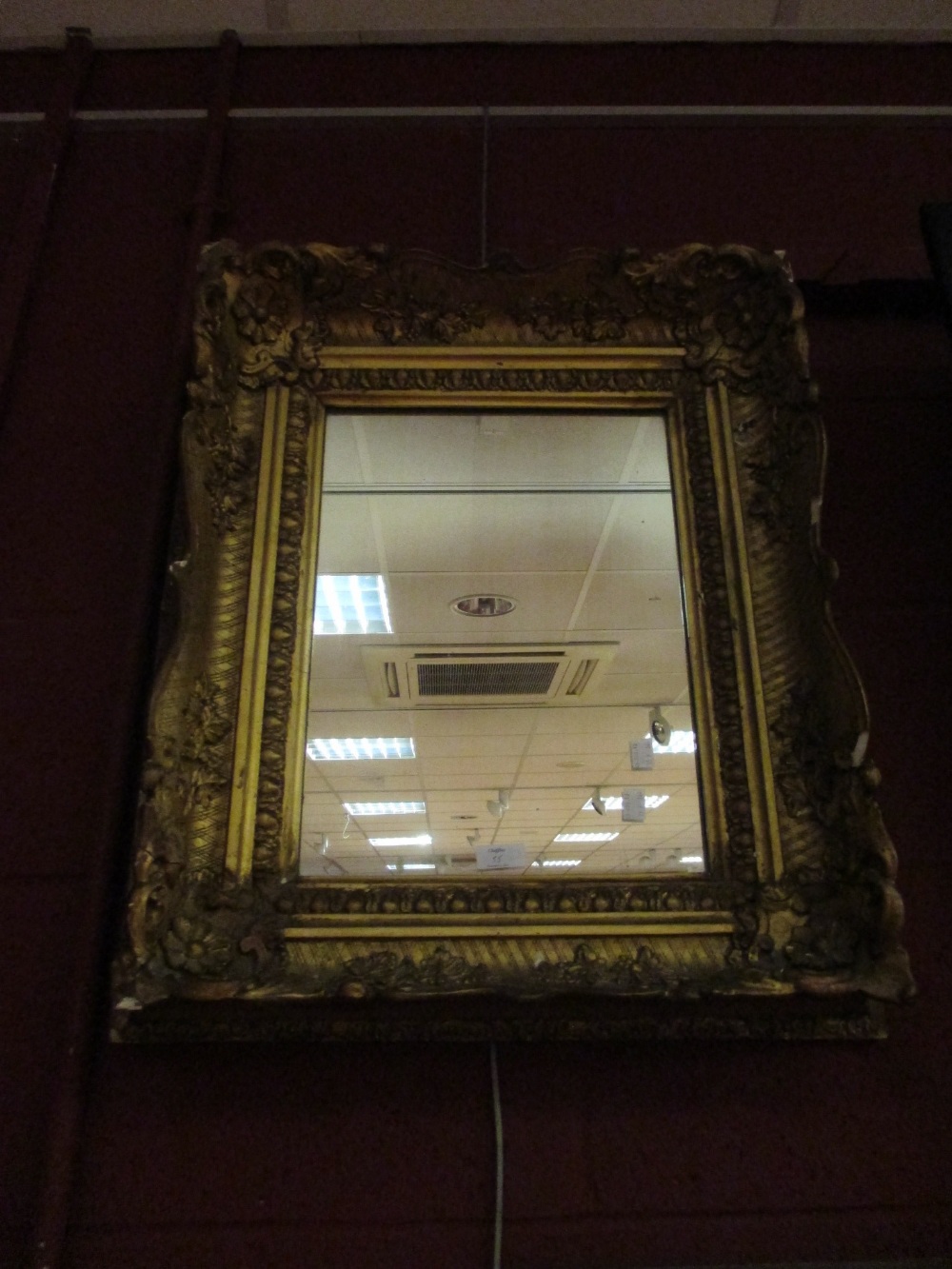 A decorative gilt mirror