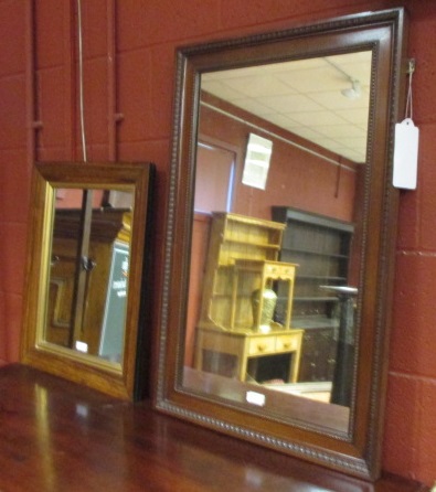 A rosewood Framed wall mirror, and another 82 (h) x 53 (h) cm (2) 57 x 46cm (22 x 18in)
