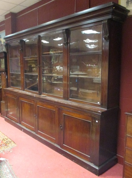 A large 19th century mahoganhy library bookcase, 250 (h) x 340cm wide x 52 (d)