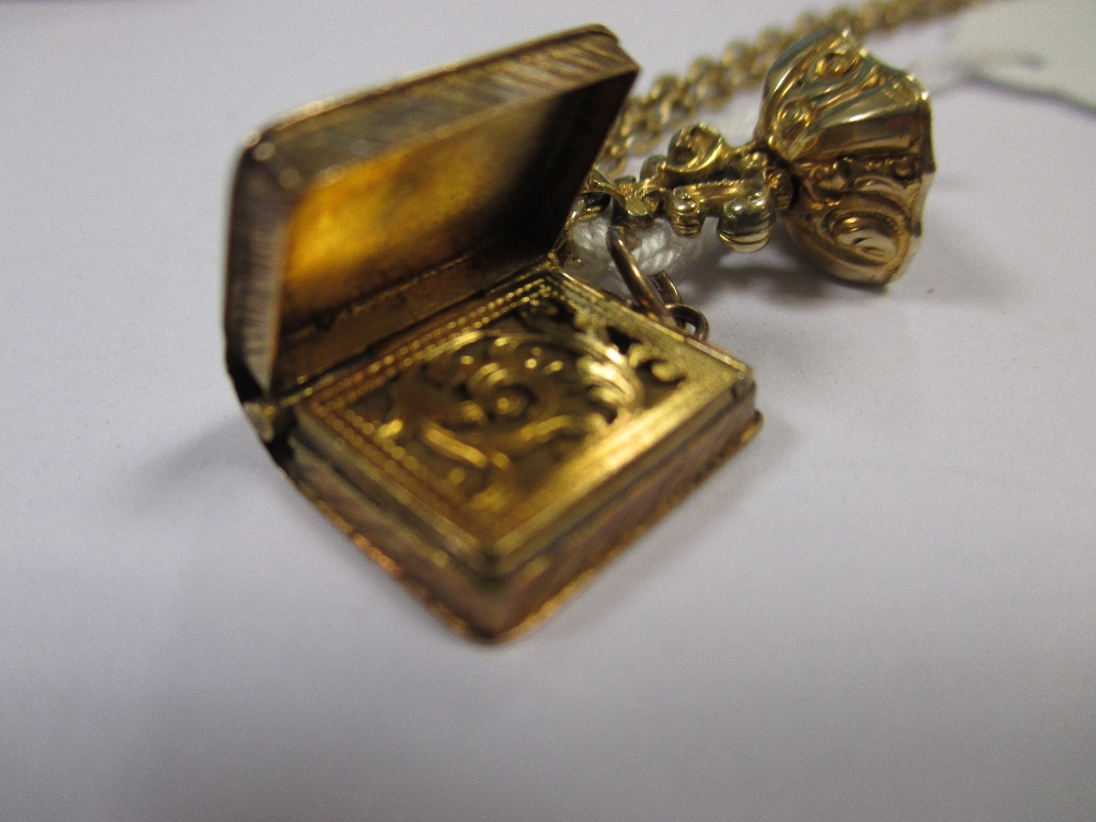 A yellow metal vinaigrette in the form of a book, a citrine fob and a quantity of assorted charms - Image 2 of 4