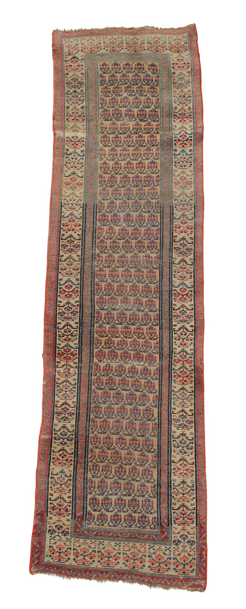 A Persian Sarab runner, repeated boteh pattern, on a camel ground 97 x 337cm (38 x 131in) Sewn