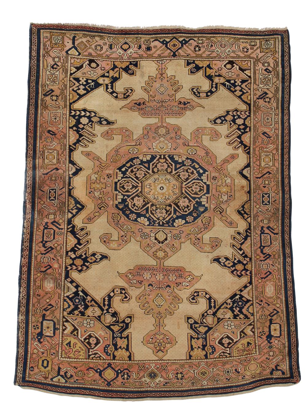 A Persian rug - possibly Niriz 145 x 190cm (57 x 74in)