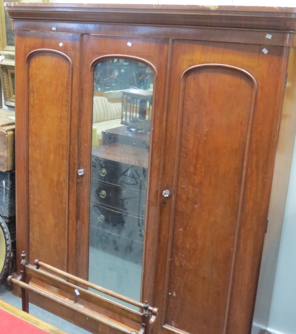 A mahogany wardrobe A/F. Height 206cm. Width 186cm. Depth 55cm.