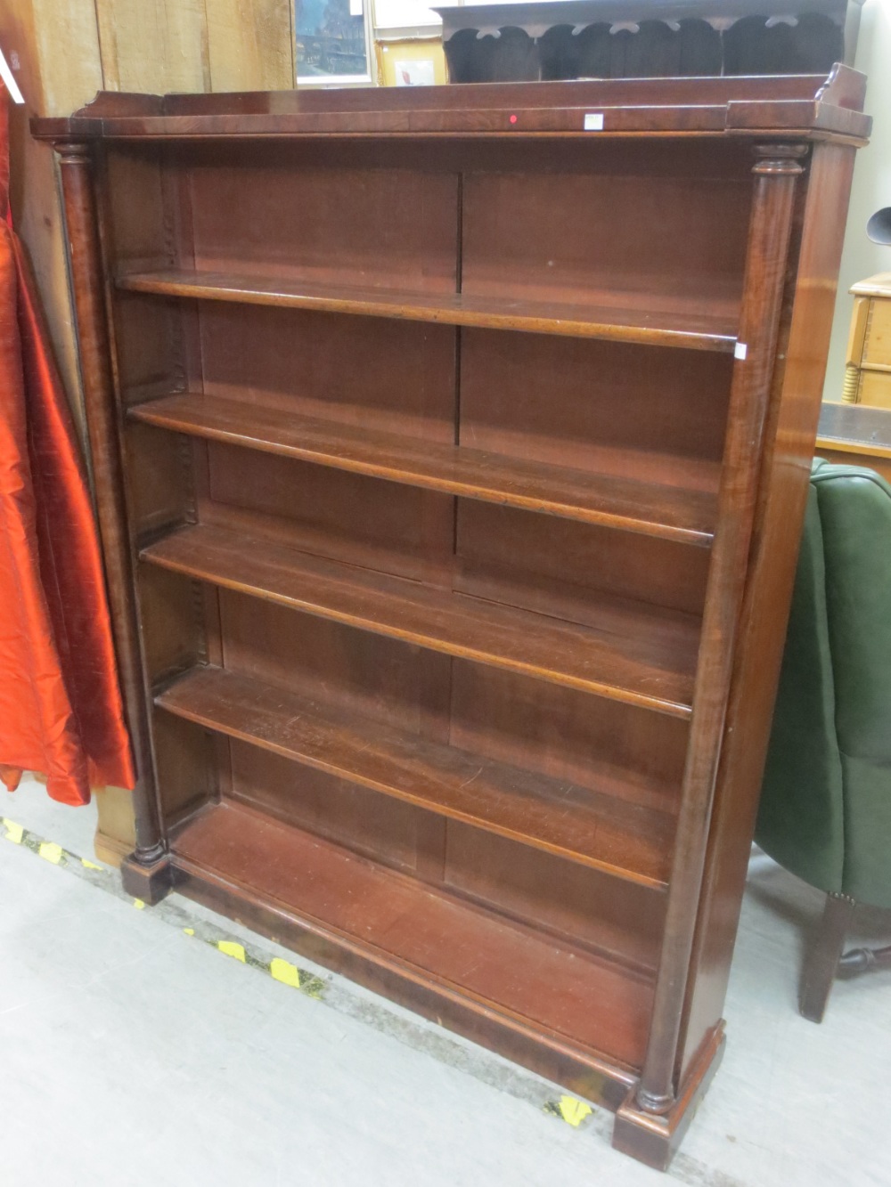 A 19th century mahogany five shelf open bookcase with pilaster sides. Height 158cm. Width 124.5cm.