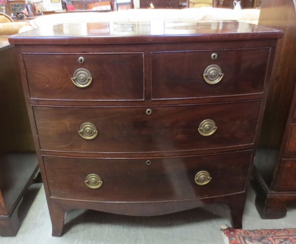 A 19th century mahogany bow front chest of drawers. Height 90cm. Width 89cm. Depth 50cm.