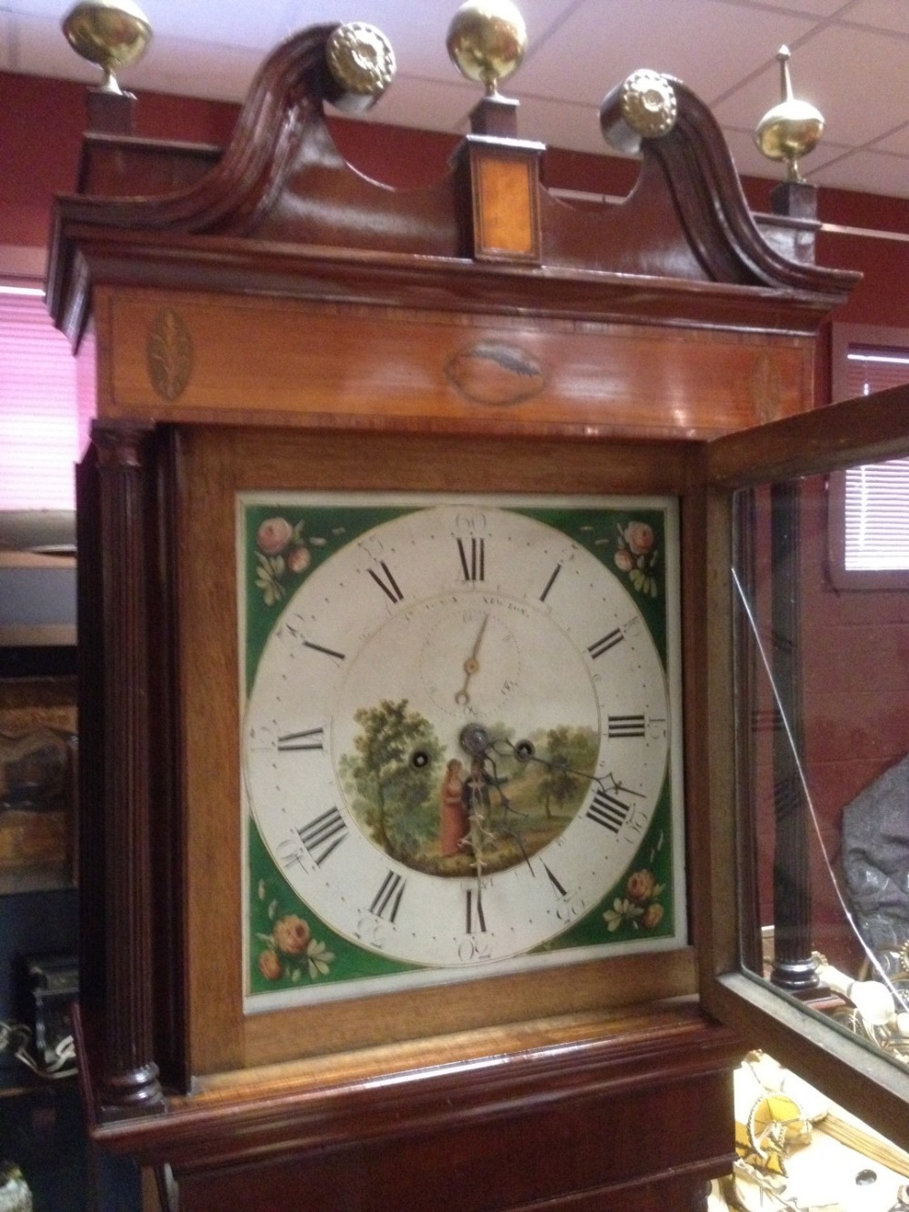 Newton, a 19th century 8 day mahogany and satinwood banded longcase clock, the hood with swan neck