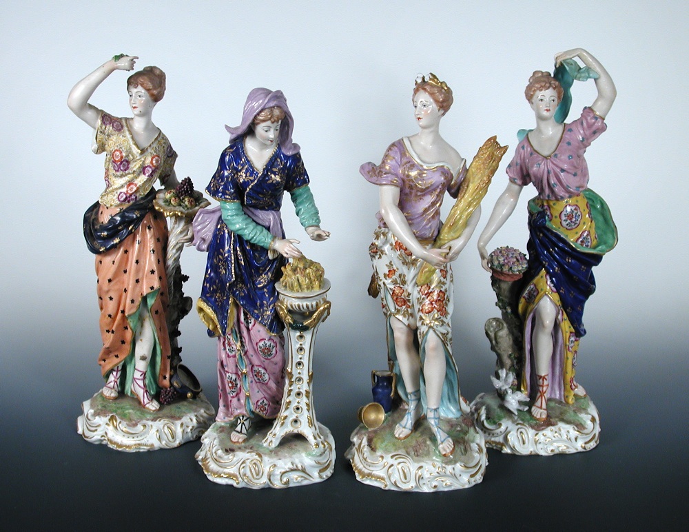 A set of four Samson `Derby` figures representing the seasons, the ladies standing with spring