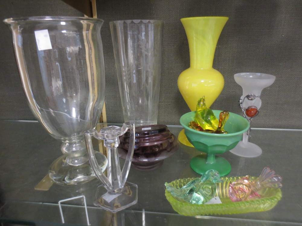 A collection of glass to include two celery vases, a cloud glass rose bowl and coloured glass birds
