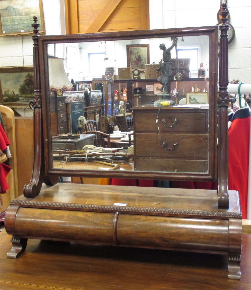 A 19th century rectangular dressing mirror with two drawers below