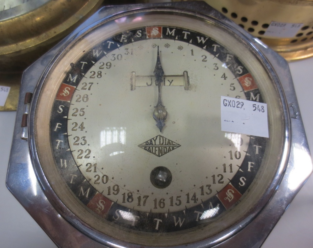 Two brass ships bulk head clocks and a chrome `Day Dial Calendar`