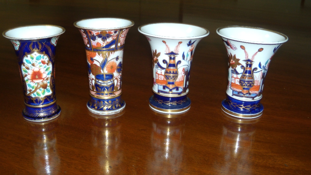 A pair and two other Spode spill vases, each decorated in the Imari palette, the former with