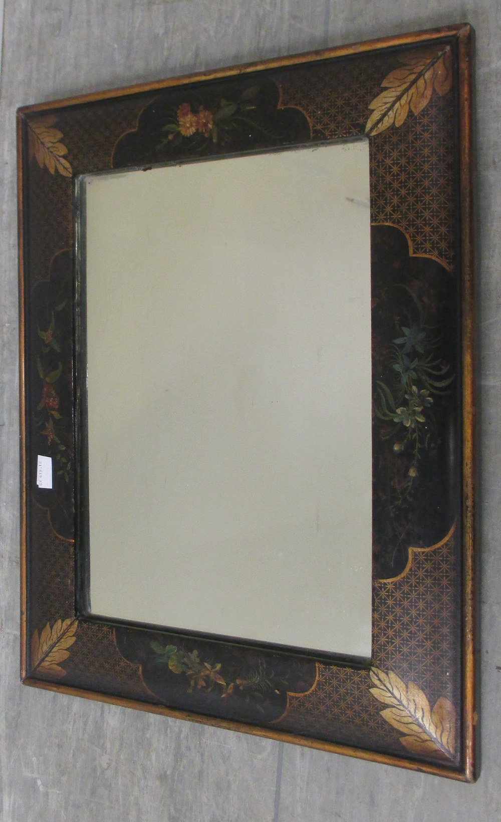 A Lacquer framed mirror and two gilt framed silkwork panels (3)
