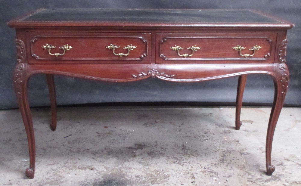 A 19th century mahogany bureau plat, leather lined top, fitted two small drawers, on swept legs,