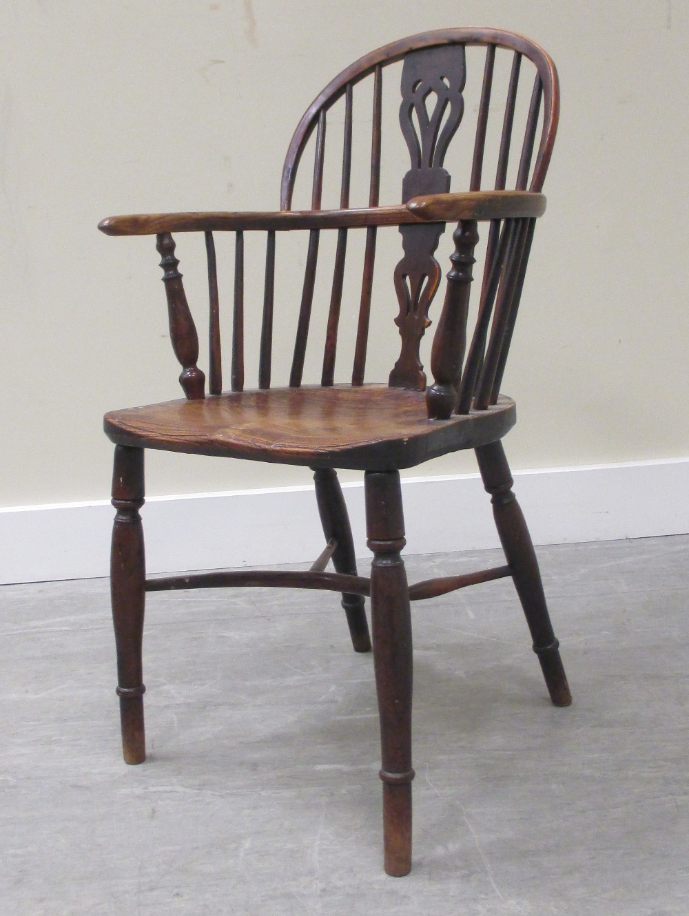 An ash and elm seated windsor chair