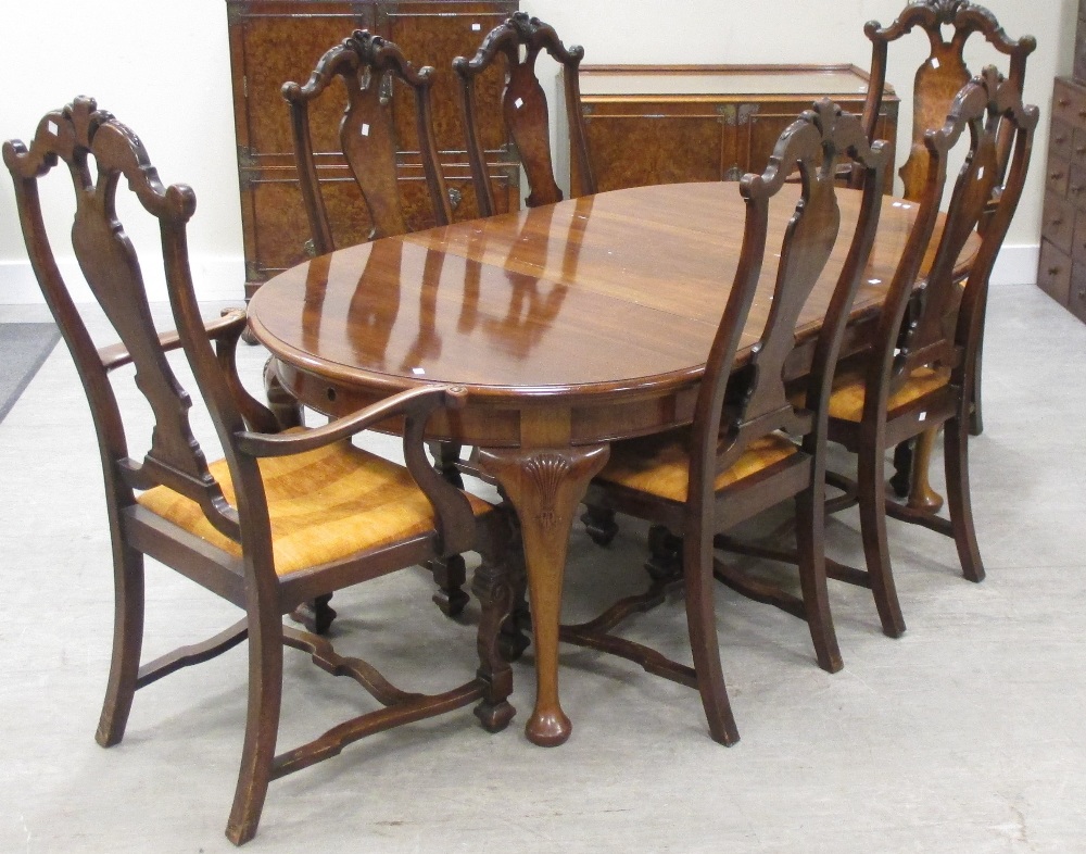 A late Victorian mahogany extending dining table, 71 x 107cm, and a set of six walnut dining