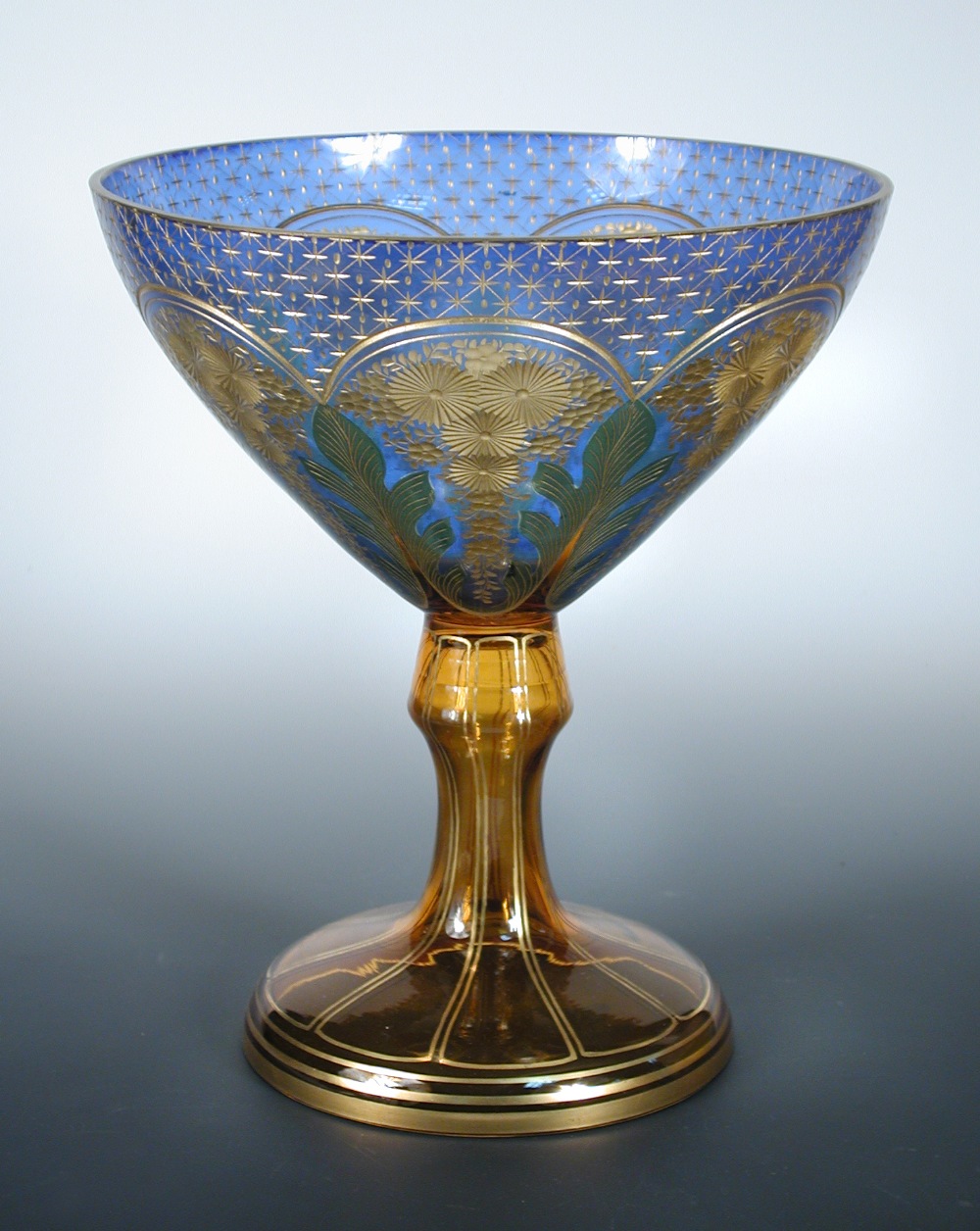 A late 19th/early 20th century Bohemian blue and amber tazza, the exterior of the rounded conical