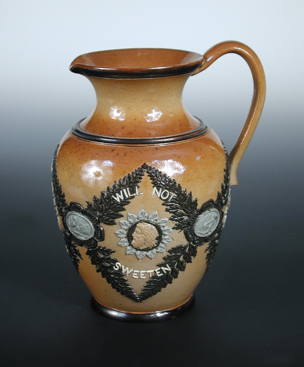 A Doulton Lambeth stoneware water jug, with applied classical roundels and laurel leaves with the