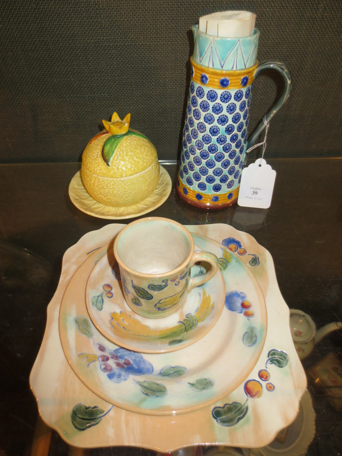 Doulton Brangwyn wares, a Carlton covered marmalade bowl and stand together with a Wedgwood majolica