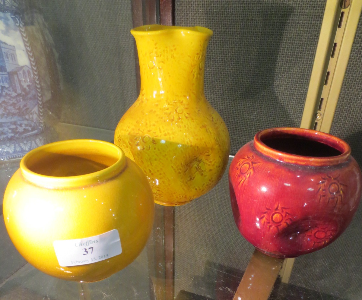 Two Burmantofts ochre vases and another blood red