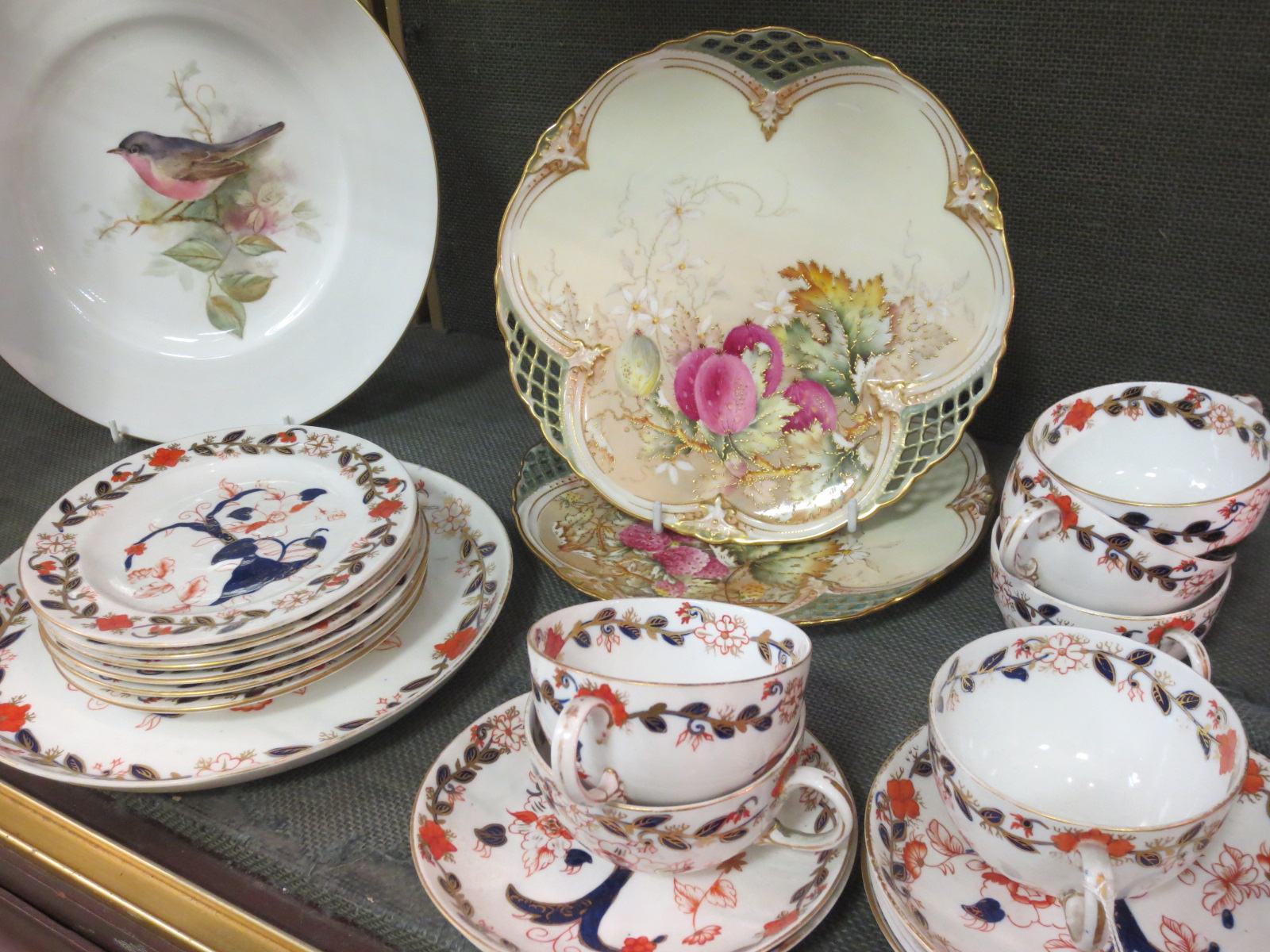 A pair of Royal Worcester plates (a/f), a Royal Worcester plate hand painted by B. Cox and a Crown