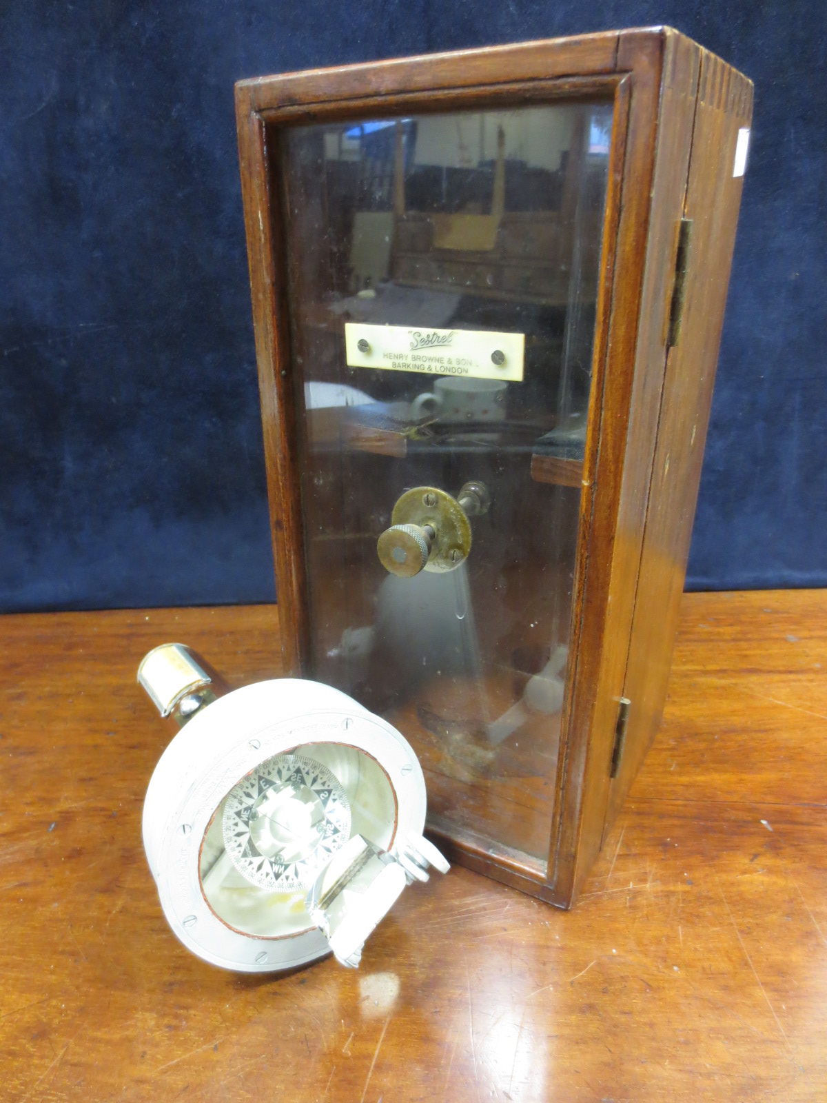 A `Sestrel` hand held yachting compass in case