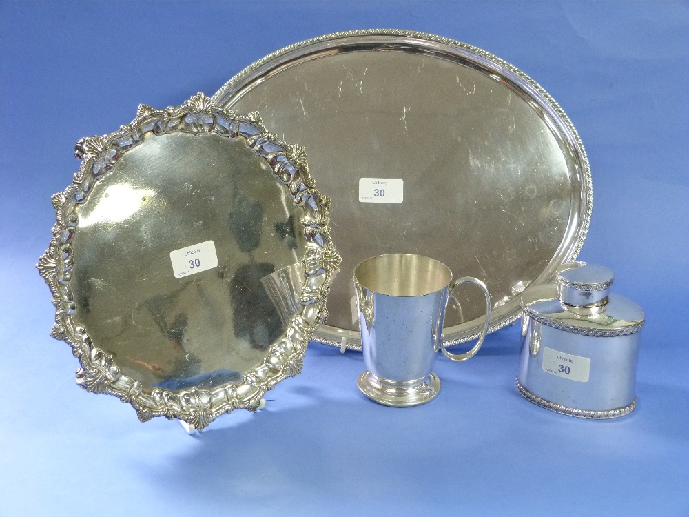 Four silver plated pieces, including a circular salver, oval salver, tea caddy and a mug (4)