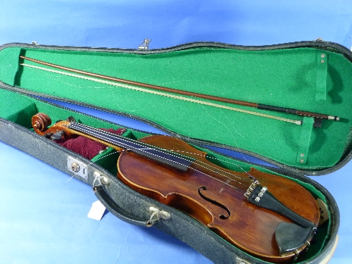 A Violin and Bow, the violin with two piece back, in a fitted case.