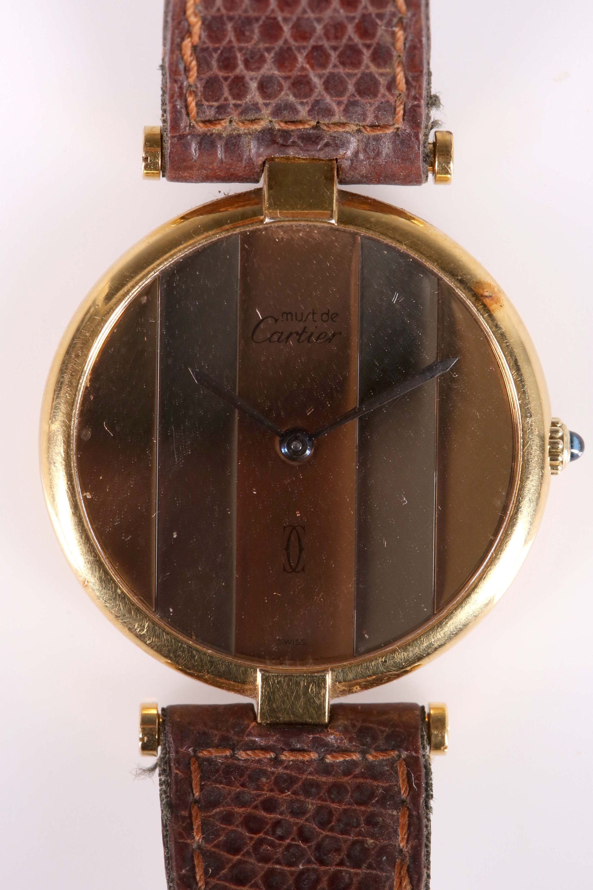 A ladies .925 silver gilt Must de Cartier dress watch, with tri-colour dial, original strap,