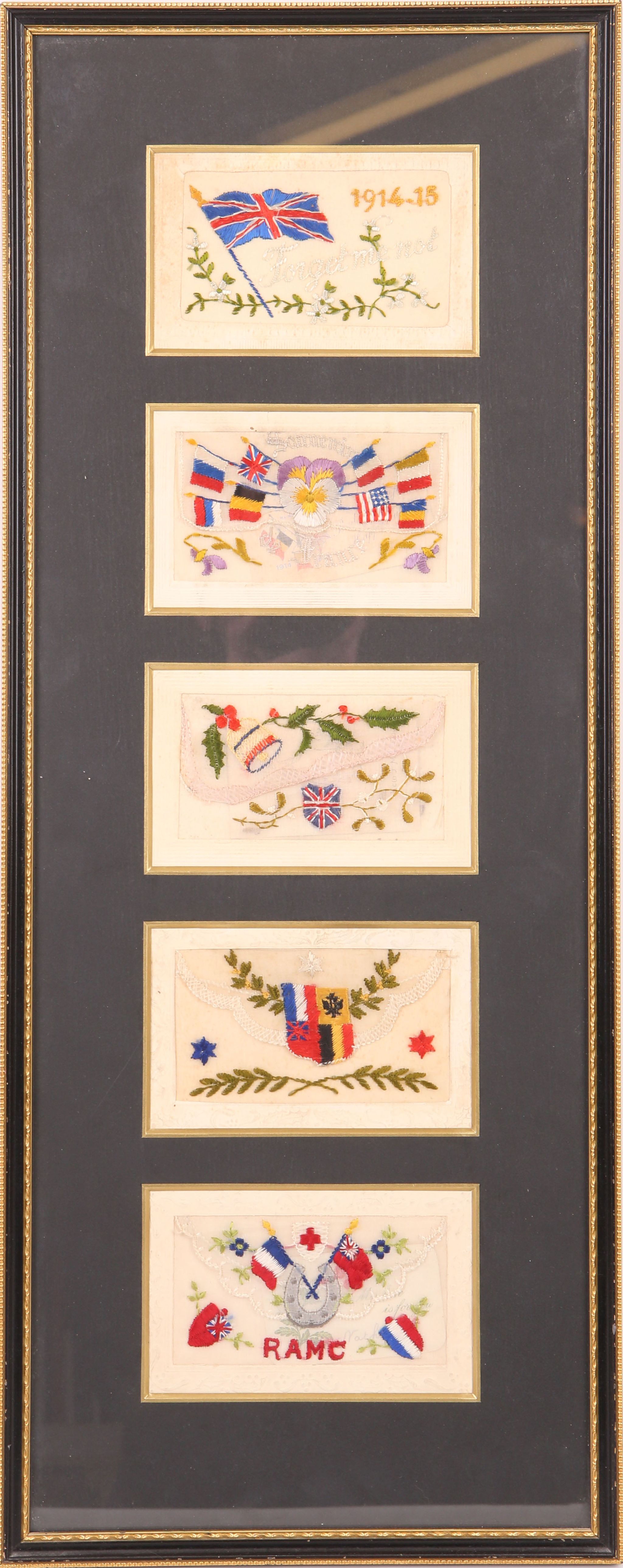 A framed set of five WW1 embroidered sweetheart postcards.