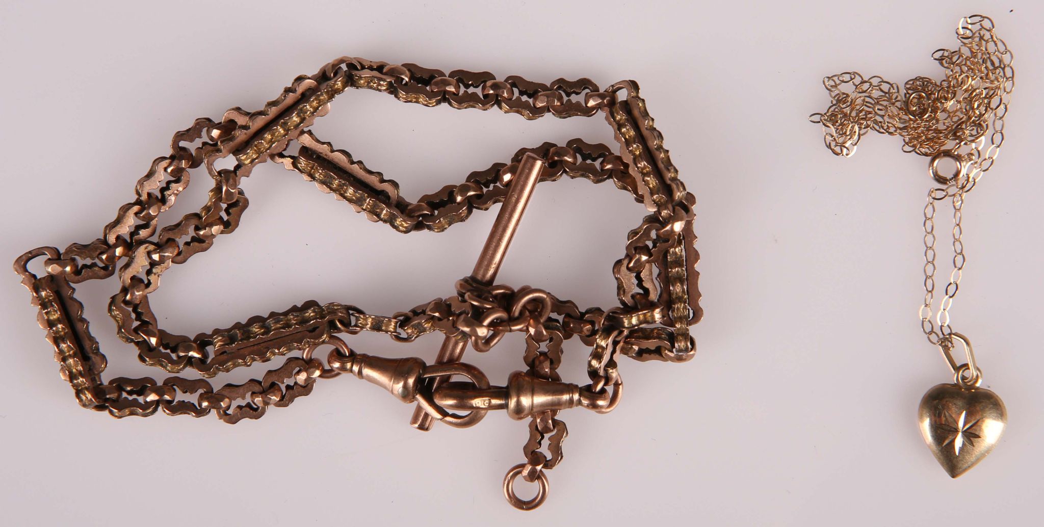 A Victorian 9ct gold fancy link fob chain, sold together with a small heart pendant on trace link