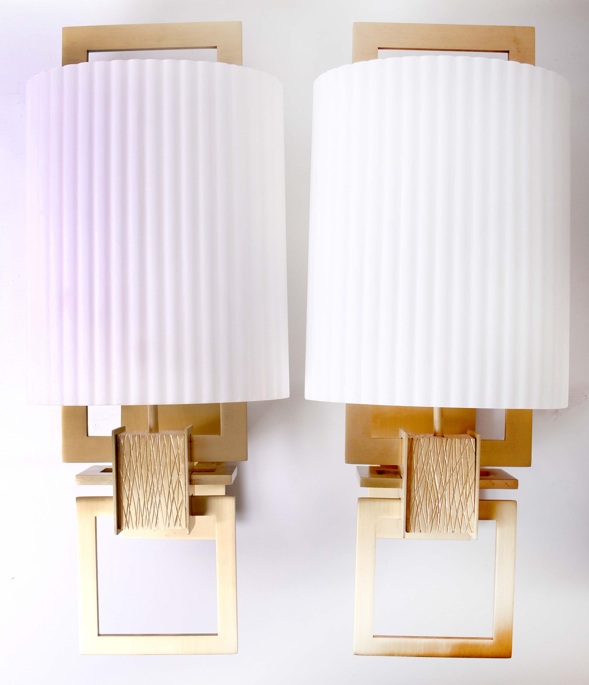 A pair of modern contemporary wall lights, white opaque glass ribbed shade, supported by brushed
