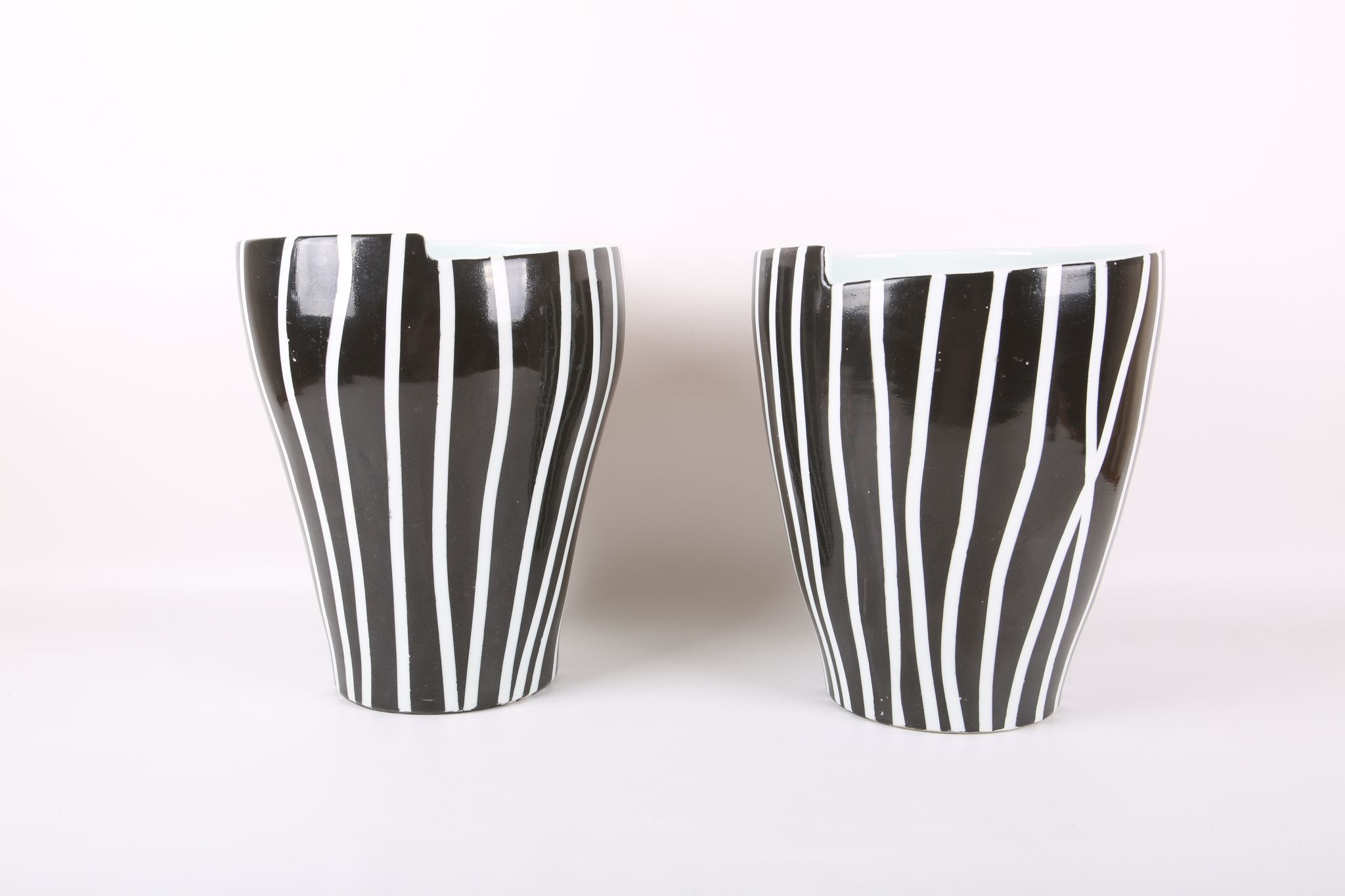 A pair of large Fabienne Jouvin vases, mid-late 20th Century, with irregular black and white striped