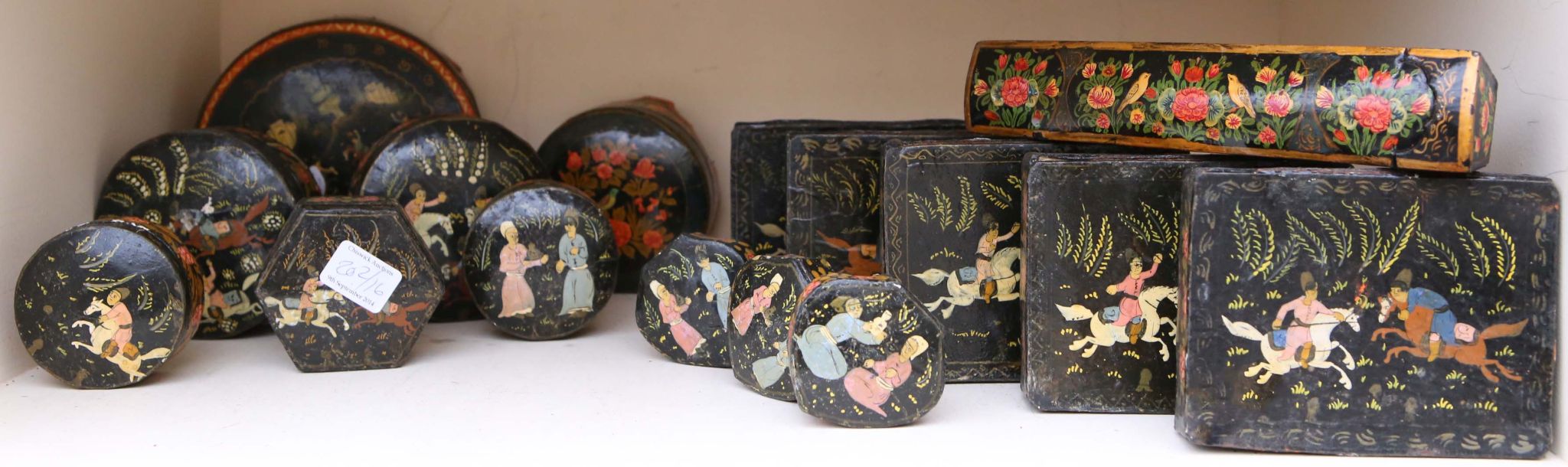 A selection of sixteen Indo / Persian painted and lacquered boxes, including powder boxes, pen