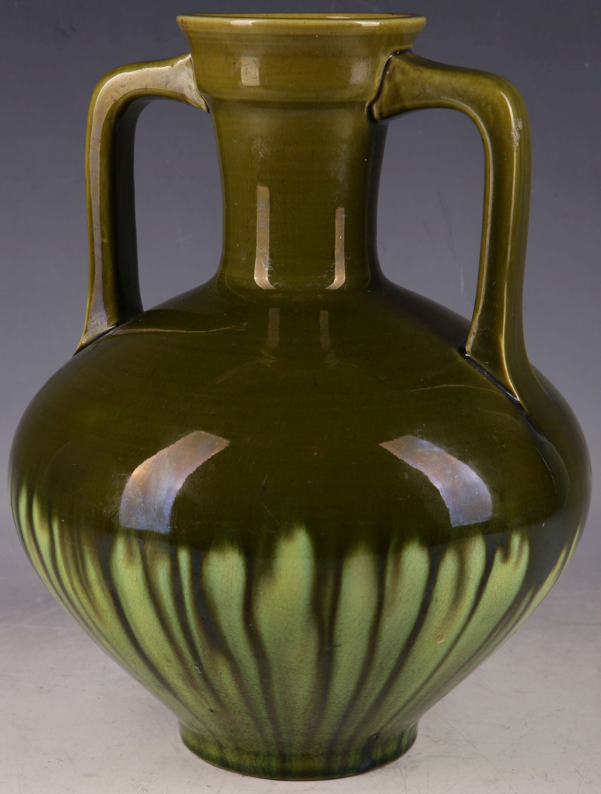 A late 19th Century Burmantofts of Leeds, art pottery terracotta twin-handled vase of simplistic