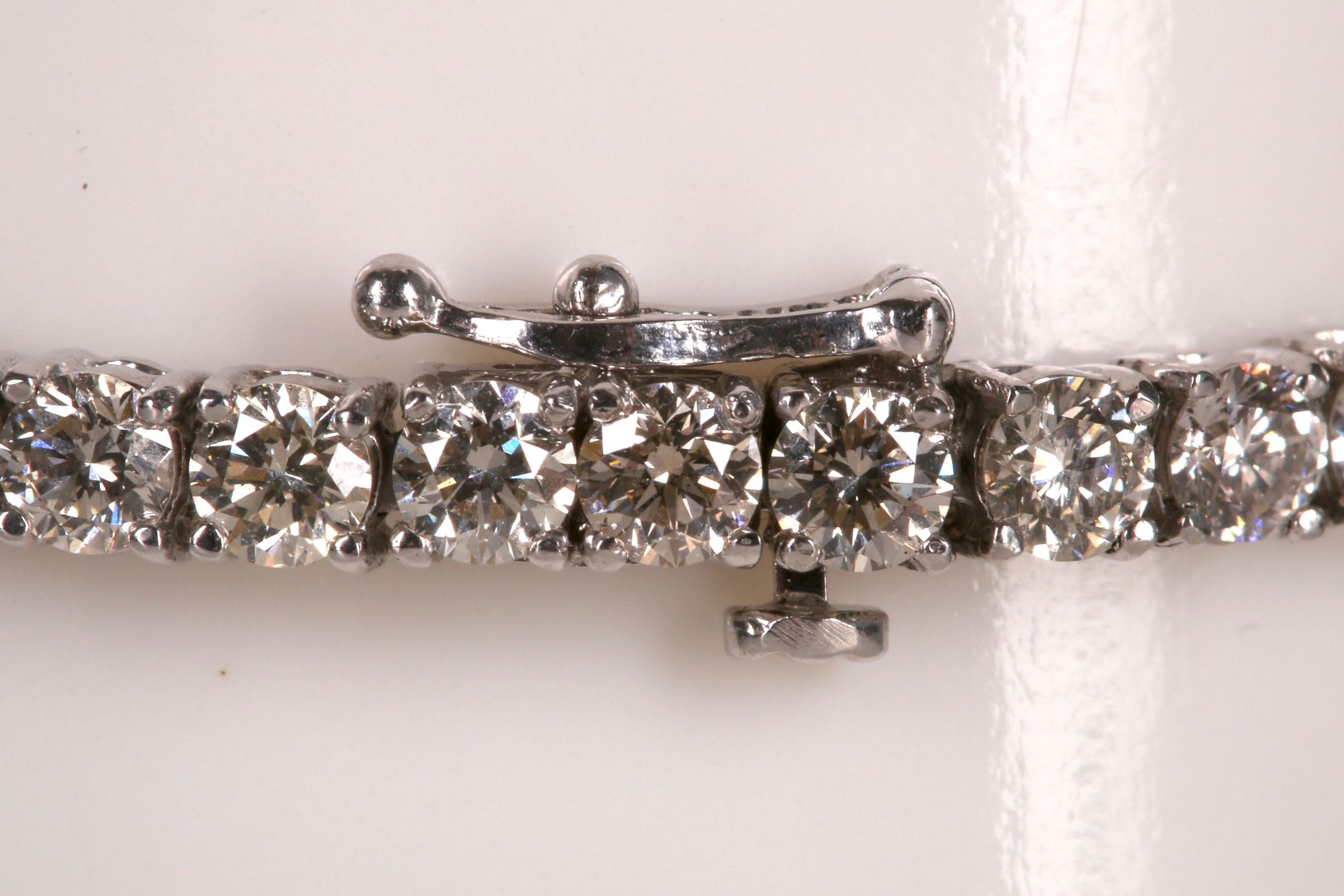 A 14k white gold and diamond line bracelet, 9.25ct total. - Image 2 of 2