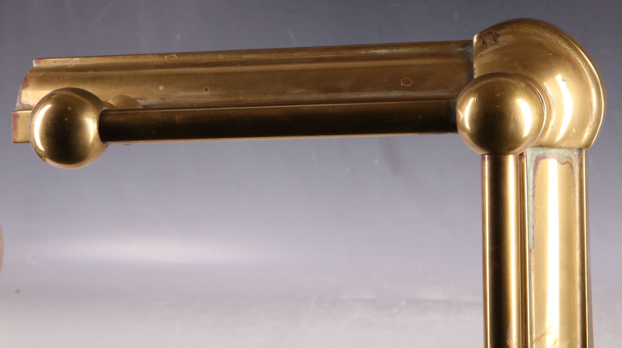 A pair of brass fire dogs, turned stem, claw feet, 54cm H and a brass fire kerb, inner width 123cm. - Image 2 of 2