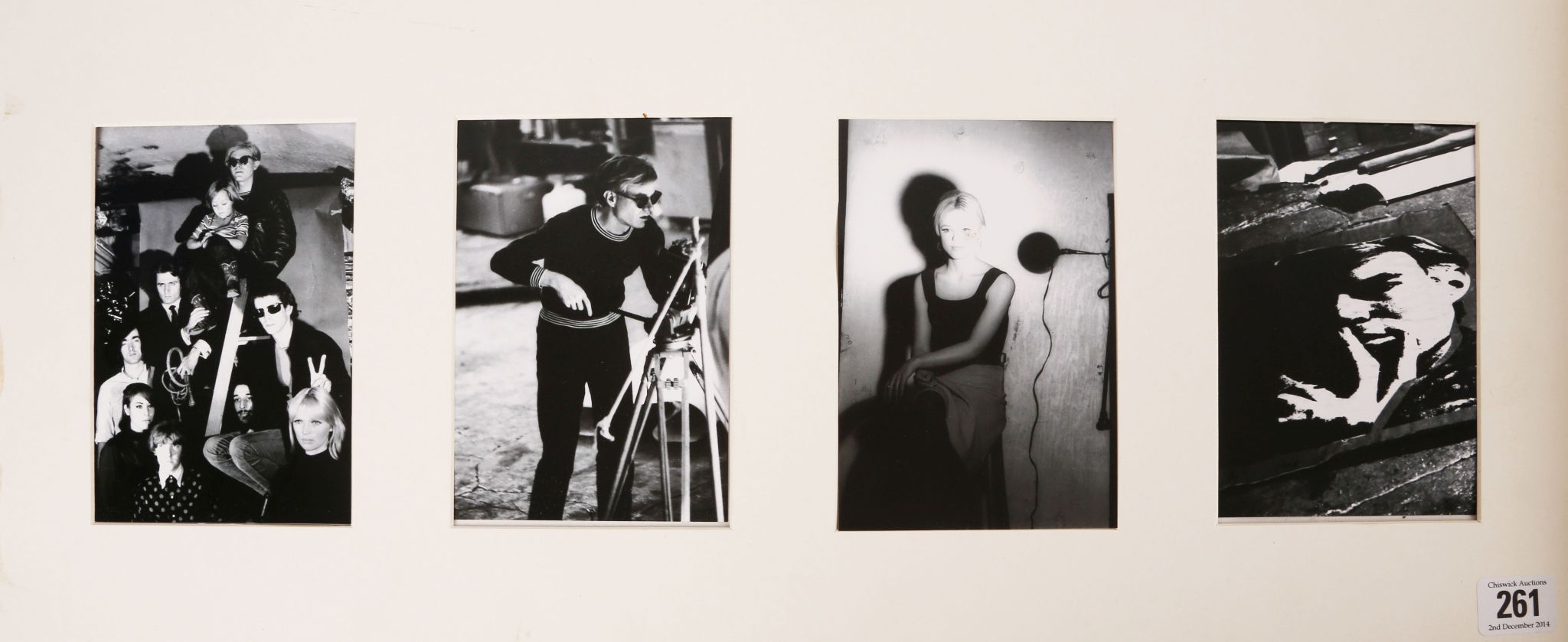 A set of four black and white photos of Andy Warhol in his studio (15 x 10cm each).